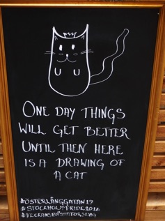 A drawing of a cat, coffee sign, Gamla Stan, Stockholm